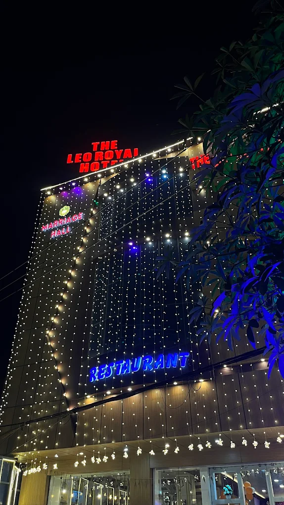 The Leo Royal Hotel Muzaffarpur lit up at night
